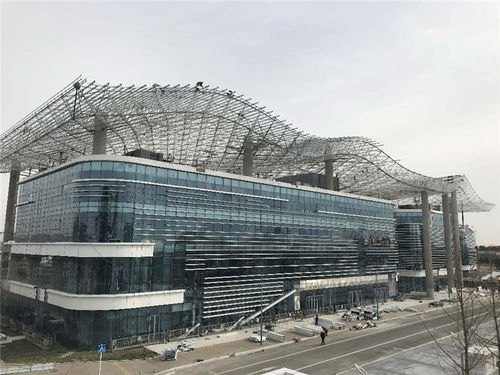 光磊鋼構(gòu)實(shí)力雄厚 專業(yè)打造螺栓球網(wǎng)架鋼結(jié)構(gòu)建筑